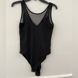 Black Kendall+Kylie mesh body suit. Never worn. Size small